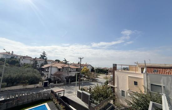 Дом в городе в Панораме